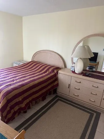 a kitchen with a sink cabinets and appliances