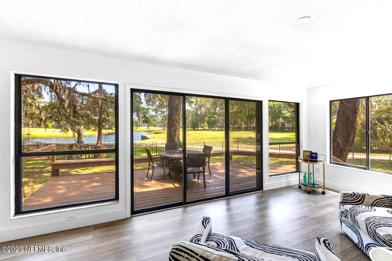 4309 Monument Road Jacksonville, FL 32225 - Photo 14 of 65 Sunroom opens to Deck