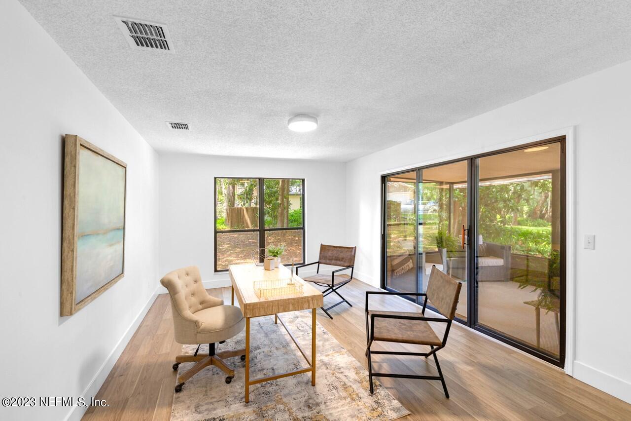 4309 Monument Road Jacksonville, FL 32225 - Photo 28 of 65 a living room with furniture and a window