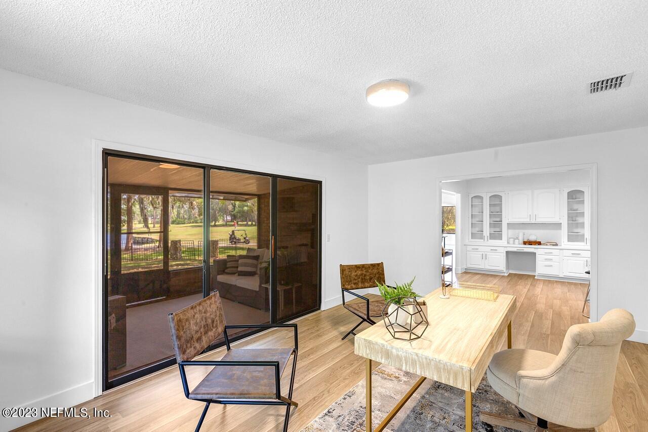 4309 Monument Road Jacksonville, FL 32225 - Photo 30 of 65 a view of a dining room with furniture window and outside view