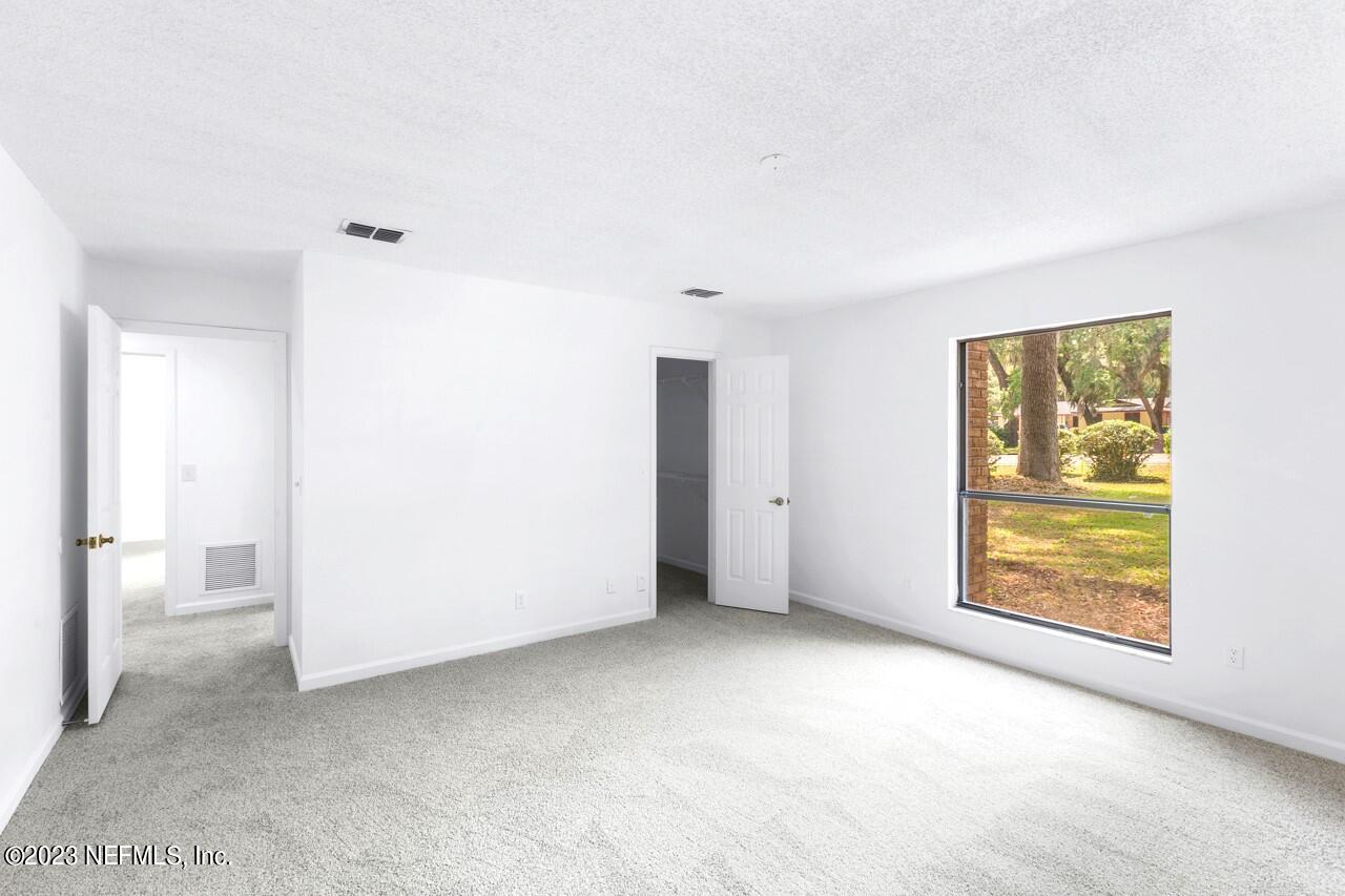 4309 Monument Road Jacksonville, FL 32225 - Photo 47 of 65 a view of an empty room with a window