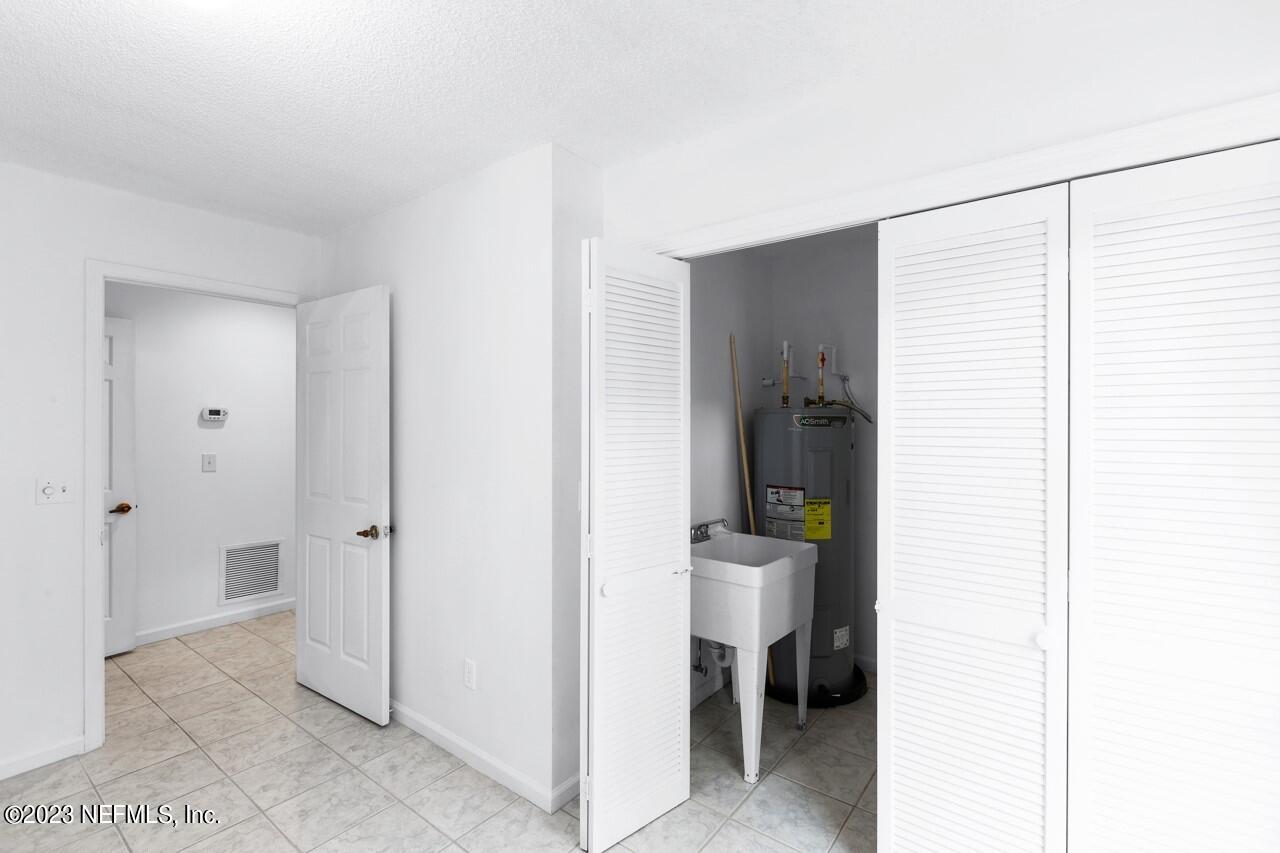 4309 Monument Road Jacksonville, FL 32225 - Photo 52 of 65 Laundry Room with Utility Closet