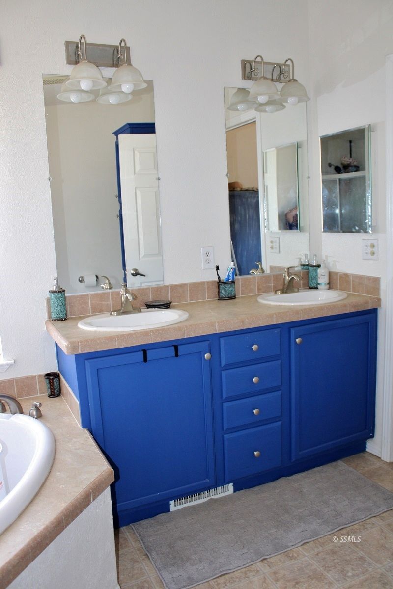 10158 Hillview Acres Road Weldon, CA 93283 - Photo 30 of 45 a bathroom with a double vanity sink and a mirror