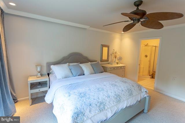 17314 King Philip Way Lewes, DE 19958 - Photo 20 of 34 a bedroom with a bed and a chandelier