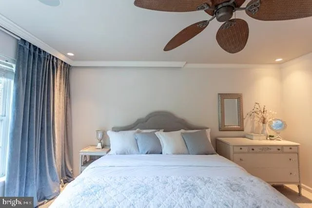 a bedroom with a bed and cabinets