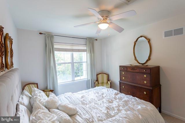 17314 King Philip Way Lewes, DE 19958 - Photo 25 of 34 a bedroom with a bed and a dresser