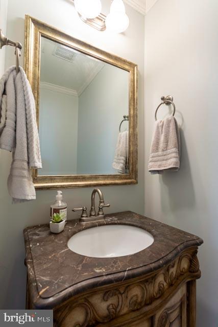 17314 King Philip Way Lewes, DE 19958 - Photo 27 of 34 a bathroom with a sink and mirror