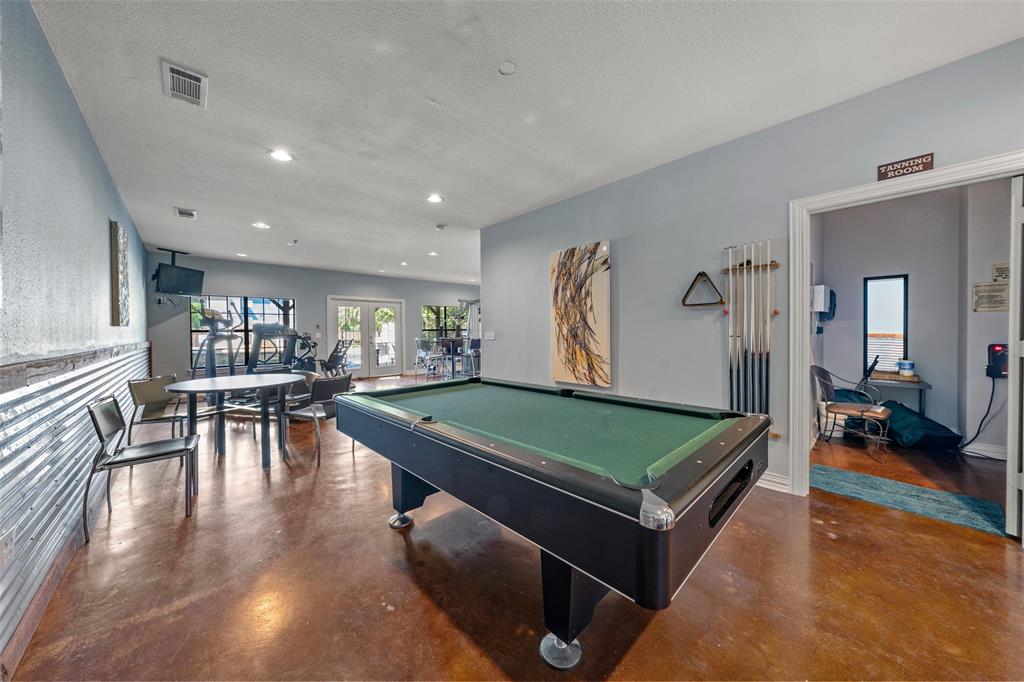 2410 South 2nd Street, Unit 1053 Waco, TX 76706 - Photo 18 of 27 Recreation room with finished concrete flooring, french doors, pool table, and recessed lighting
