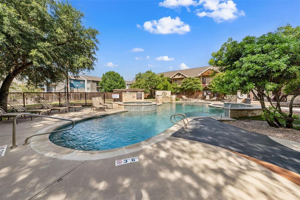 2410 South 2nd Street, Unit 1053 Waco, TX 76706 - Photo 21 of 27 View of pool with a patio and a pool with connected hot tub