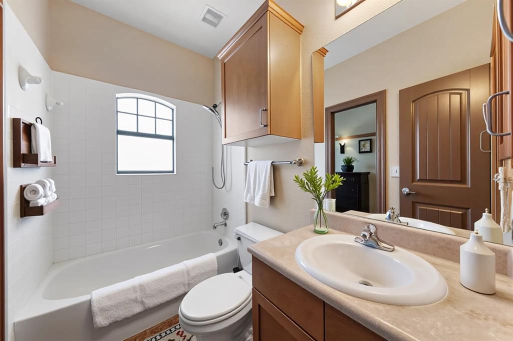 2410 South 2nd Street, Unit 1053 Waco, TX 76706 - Photo 10 of 27 Full bathroom featuring tub / shower combination and vanity