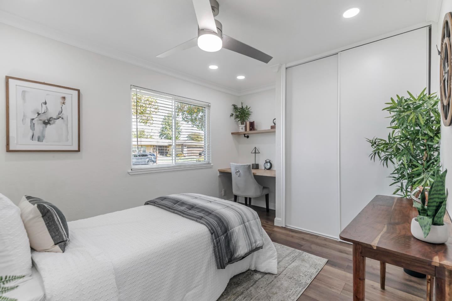 169 Turquoise Way Livermore, CA 94550 - Photo 20 of 59 a bedroom with a bed and a potted plant