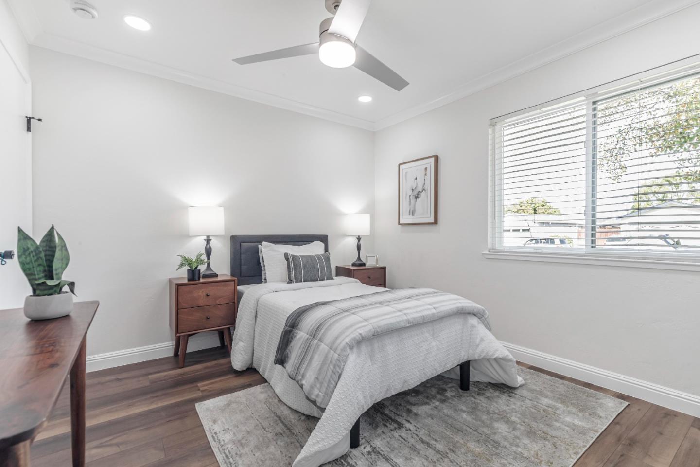 169 Turquoise Way Livermore, CA 94550 - Photo 23 of 59 a bedroom with a bed and a potted plant