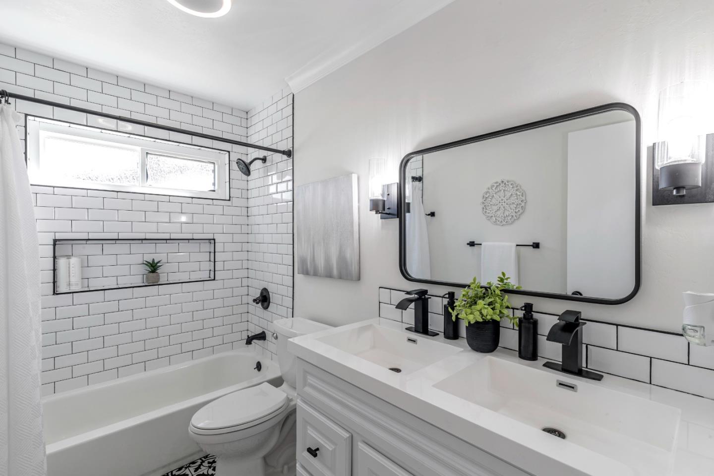169 Turquoise Way Livermore, CA 94550 - Photo 32 of 59 a bathroom with a granite countertop sink a toilet and shower