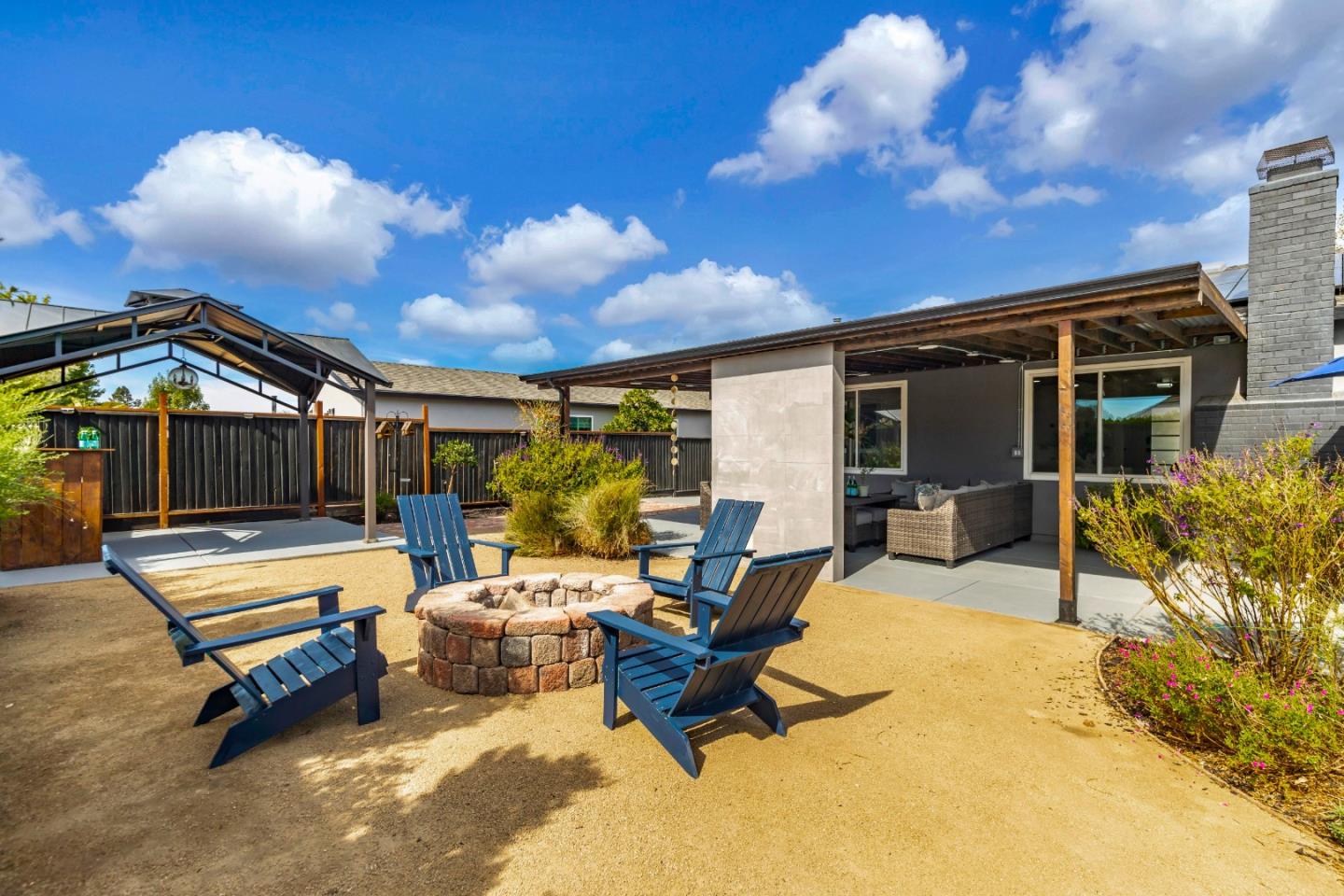169 Turquoise Way Livermore, CA 94550 - Photo 40 of 59 a patio with patio a fire pit and outdoor seating