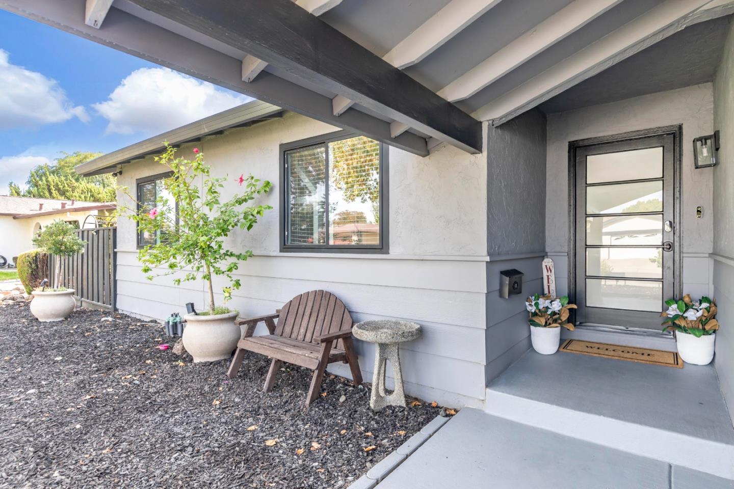 169 Turquoise Way Livermore, CA 94550 - Photo 4 of 59 a living room with furniture and a potted plant