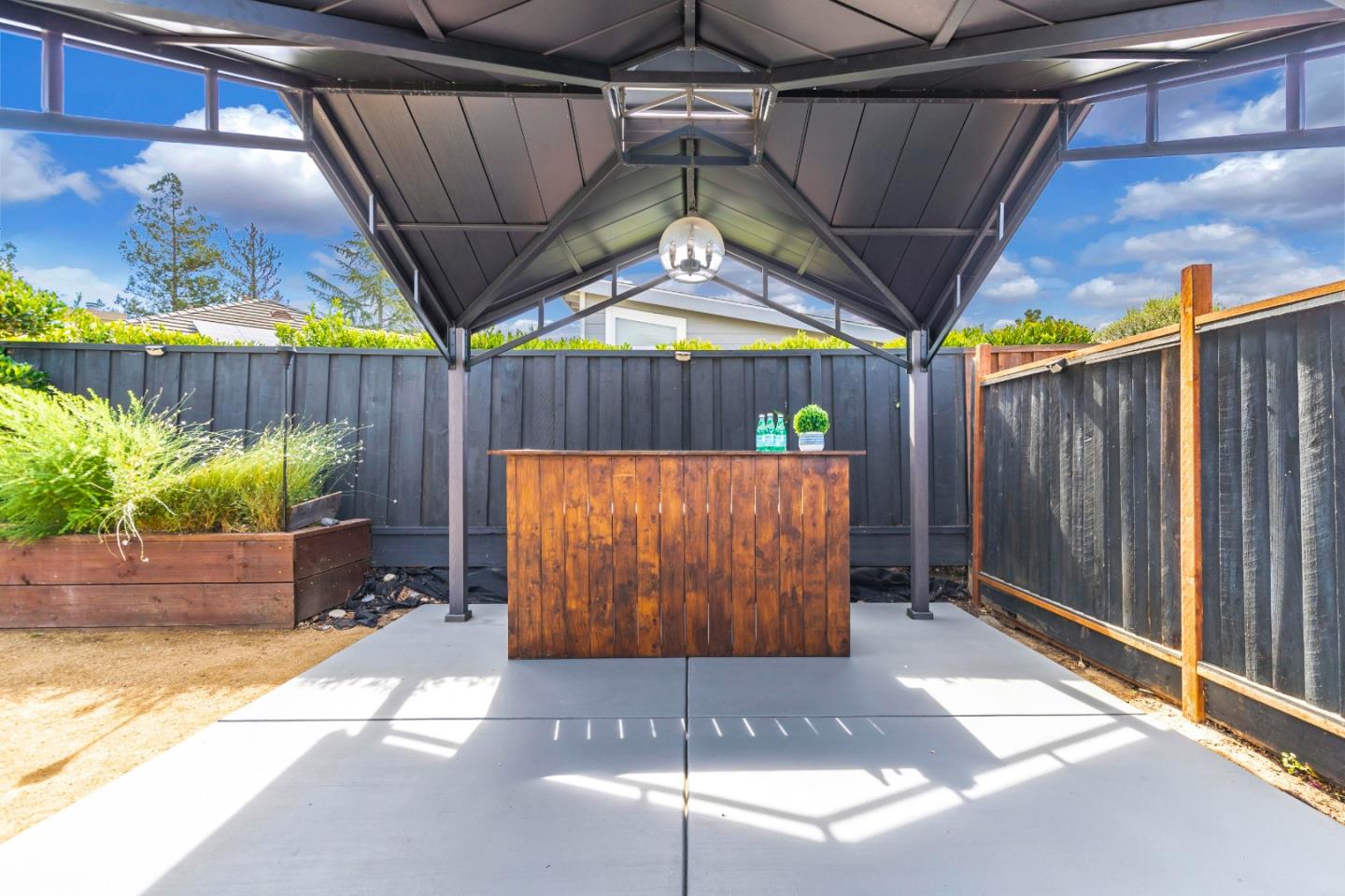 169 Turquoise Way Livermore, CA 94550 - Photo 47 of 59 a view of a garage with wooden fence