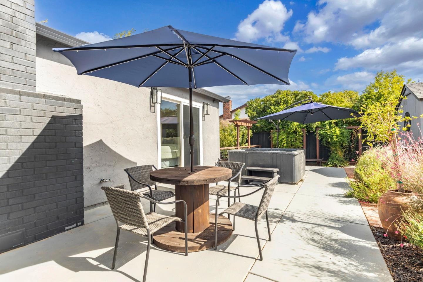 169 Turquoise Way Livermore, CA 94550 - Photo 51 of 59 a patio with a patio table and chairs