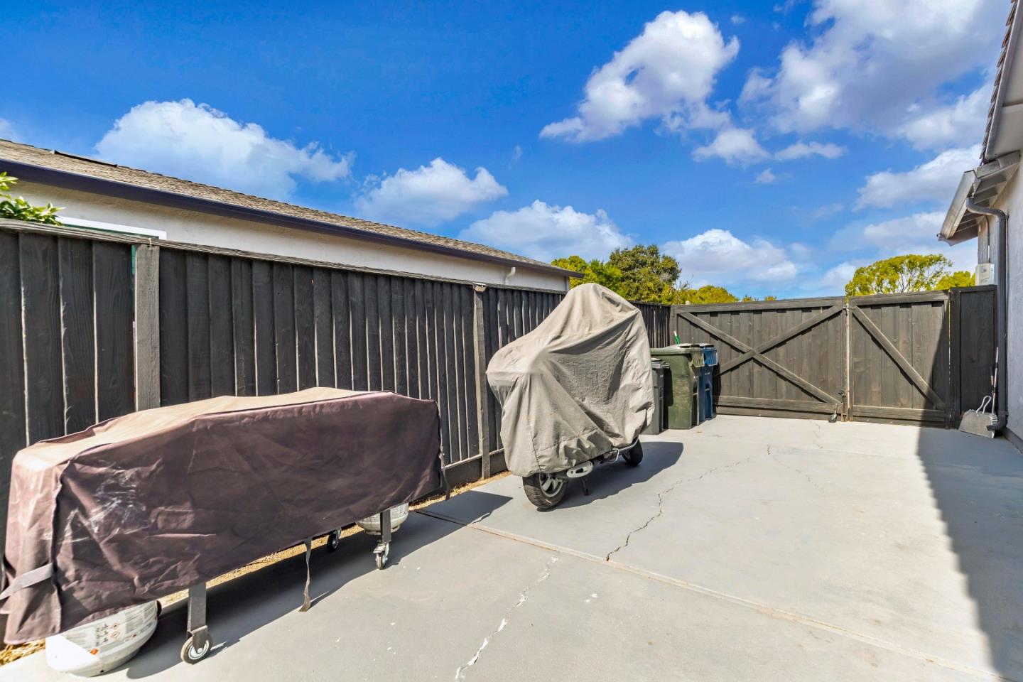 169 Turquoise Way Livermore, CA 94550 - Photo 58 of 59 a view of backyard with wheel chair and potted plants