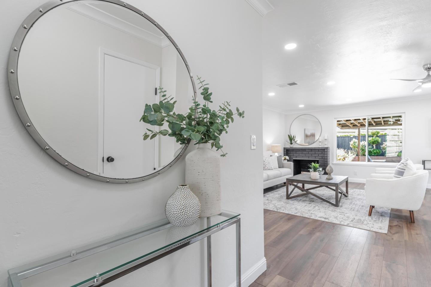 169 Turquoise Way Livermore, CA 94550 - Photo 7 of 59 a living room with furniture and a potted plant