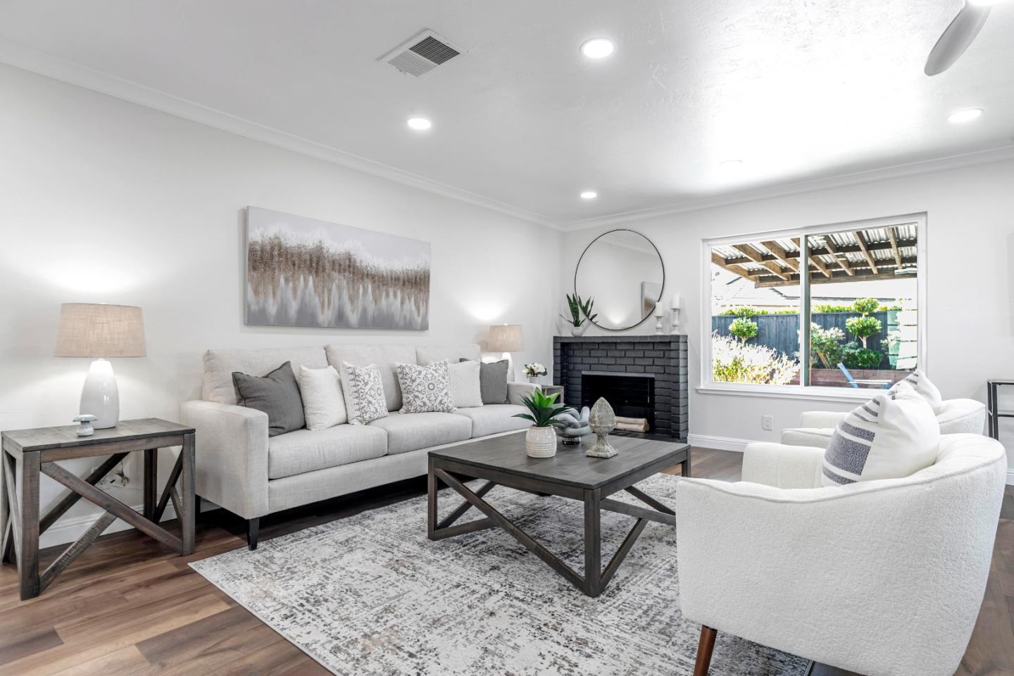 169 Turquoise Way Livermore, CA 94550 - Photo 8 of 59 a living room with furniture and a fireplace