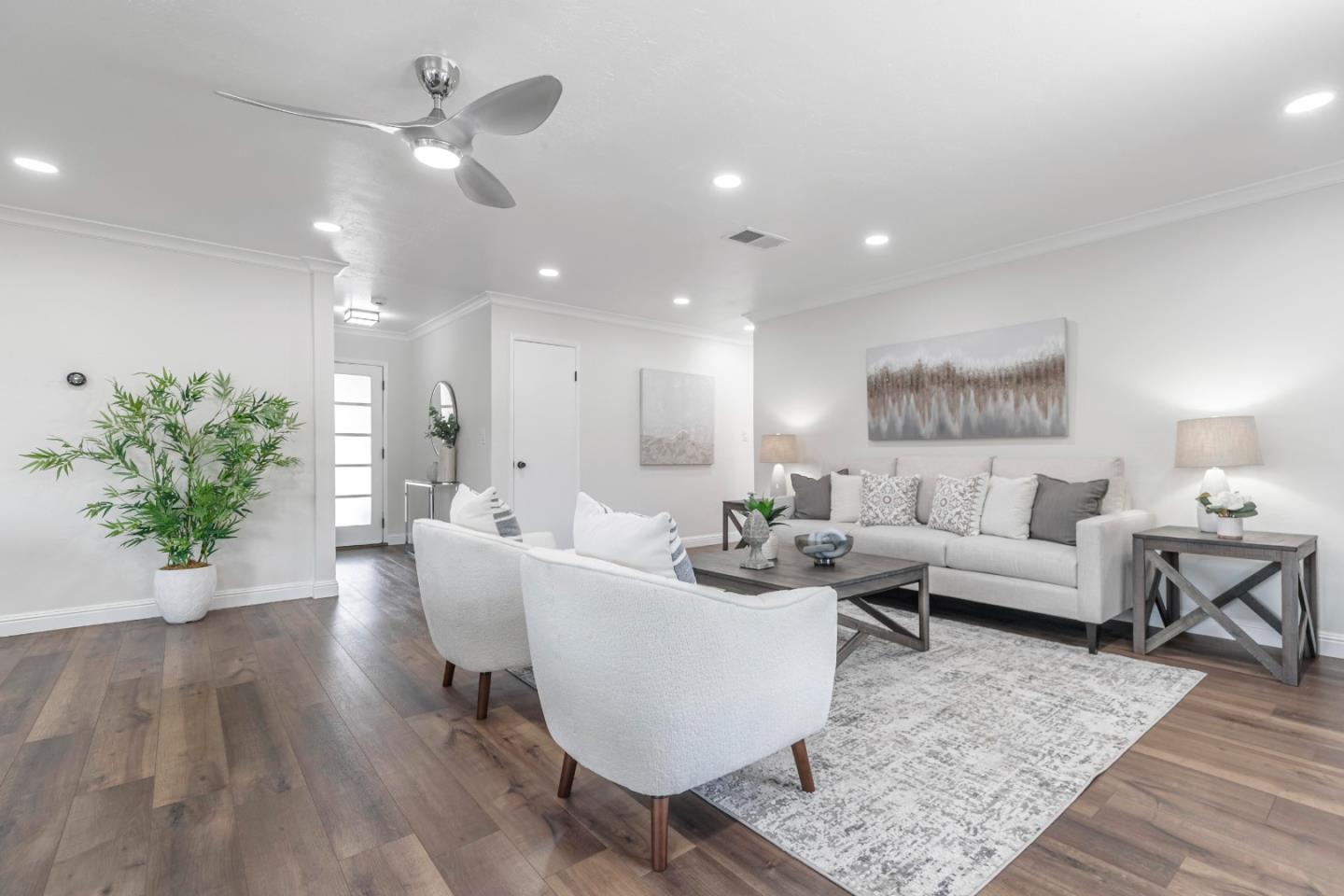 169 Turquoise Way Livermore, CA 94550 - Photo 9 of 59 a living room with furniture potted plant and a lamp