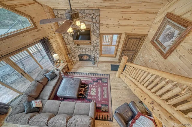 a bathroom with a granite countertop sink mirror and shower