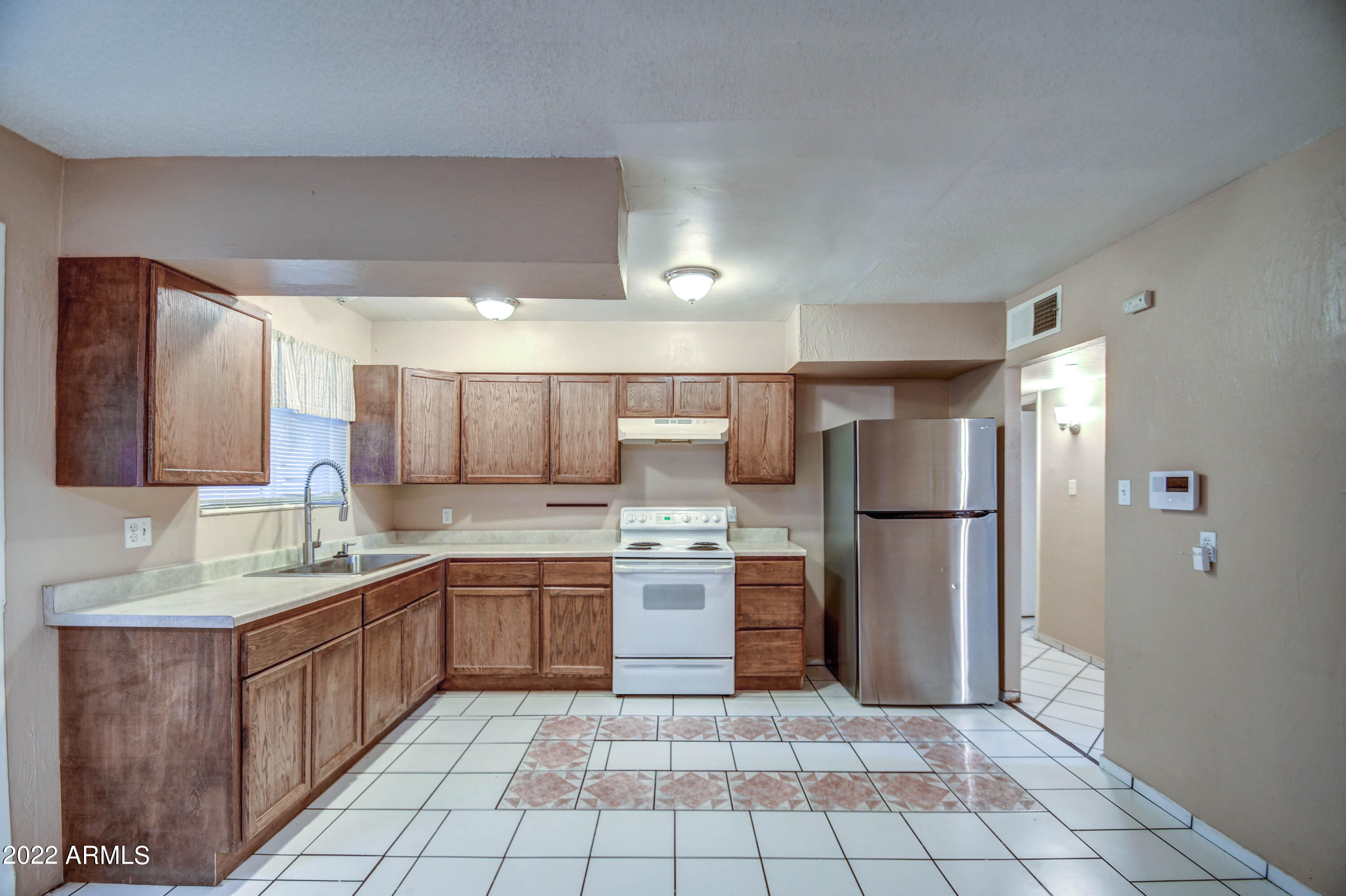6221 West Monterey Way Phoenix, AZ 85033 - Photo 7 of 19 KITCHEN 2