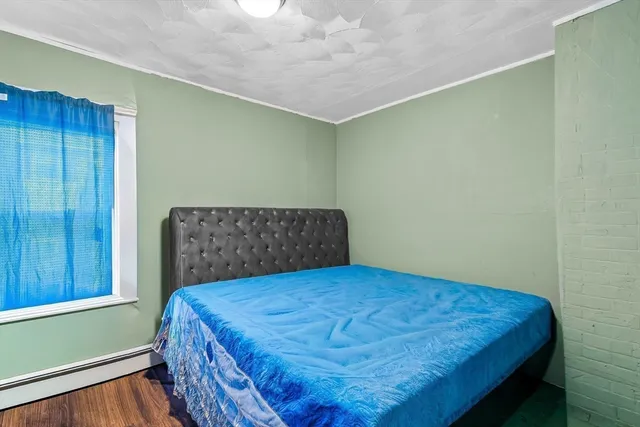 a view of a livingroom with furniture and window