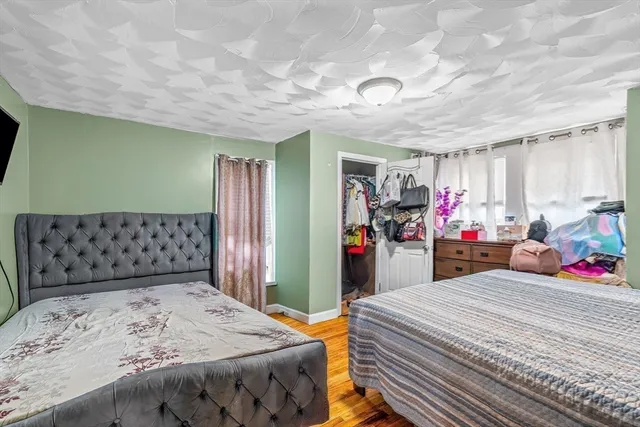 a bathroom with a sink a mirror and a window