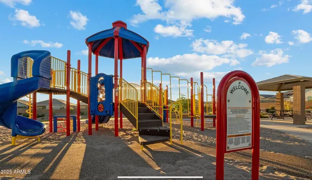 a view of a street with a building in the background