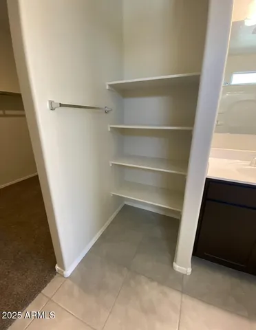 a view of small space with racks on the wall