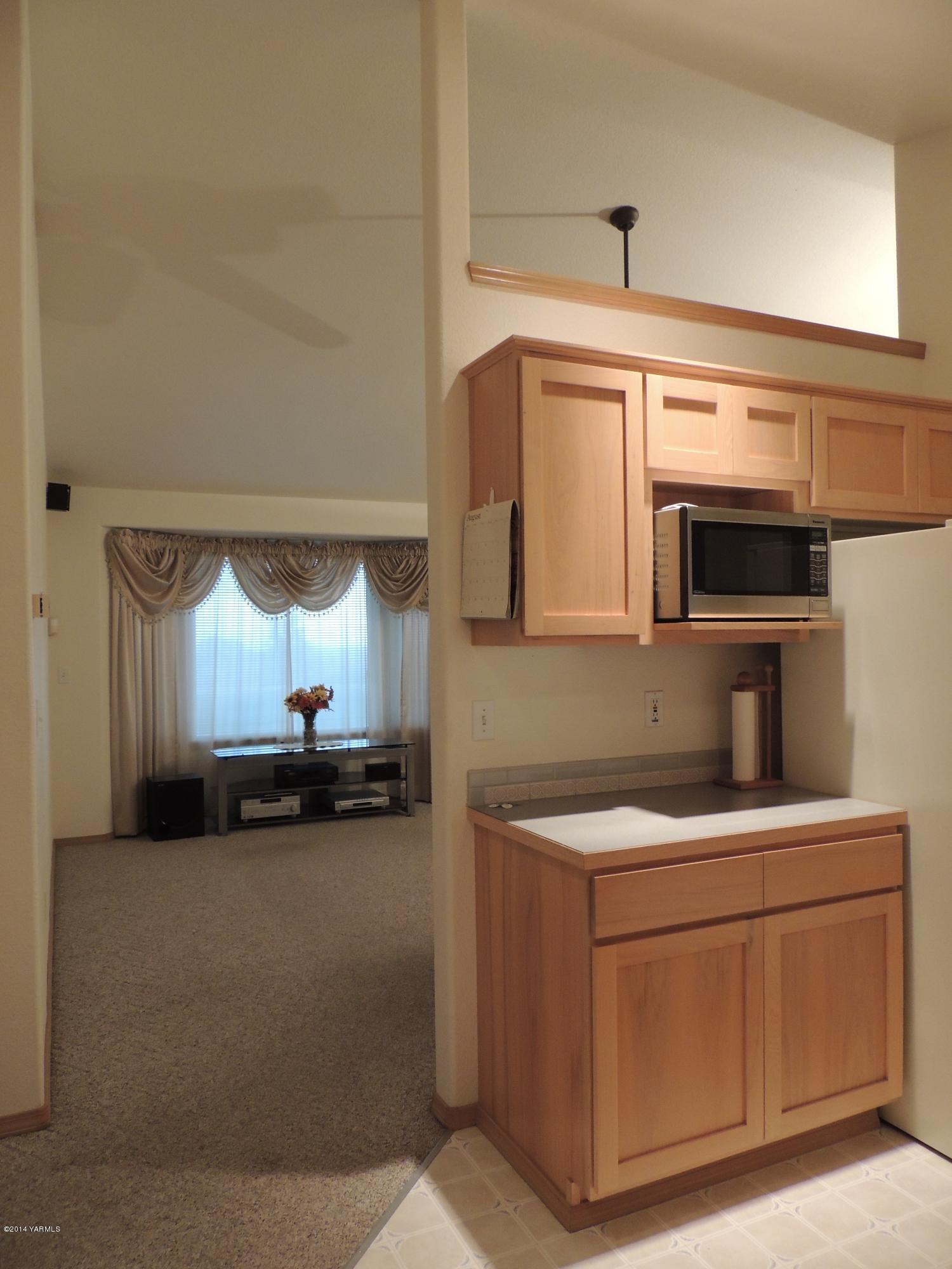 270 Red Tail Road Yakima, WA 98908 - Photo 34 of 69 a kitchen with a sink and a stove top oven