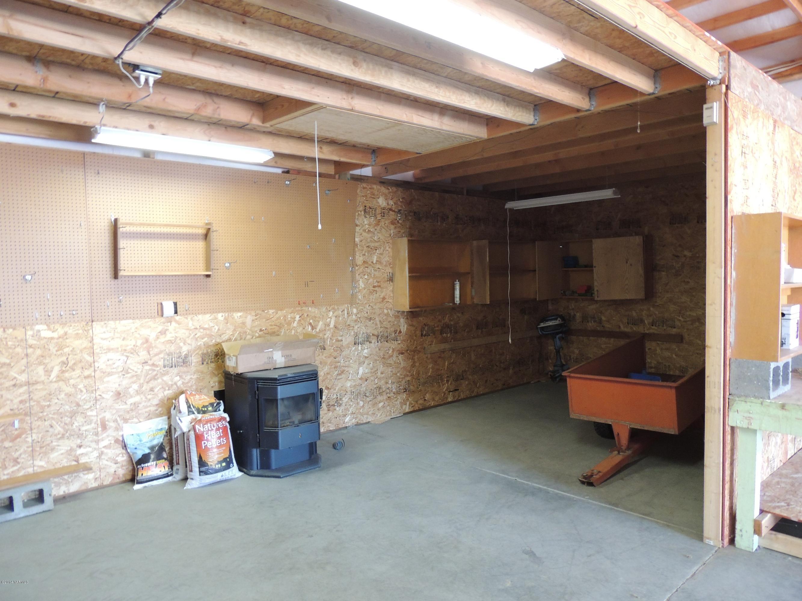 270 Red Tail Road Yakima, WA 98908 - Photo 61 of 69 a room with furniture and a fireplace