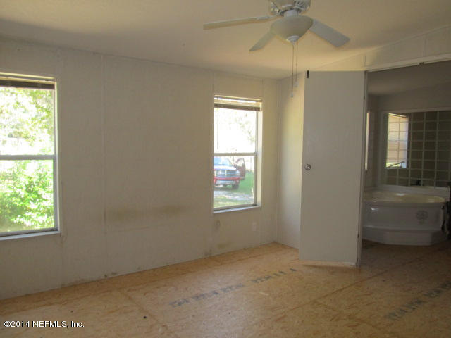 830 Gregory Road Jacksonville, FL 32234 - Photo 11 of 31 MASTER BEDROOM & BATHROOM ENTRY