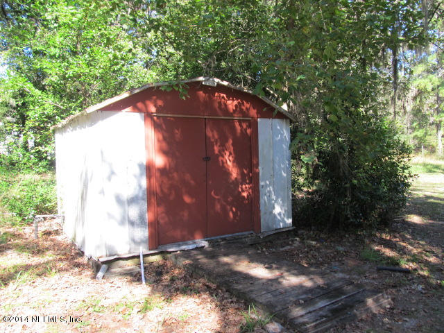 830 Gregory Road Jacksonville, FL 32234 - Photo 16 of 31 SHED/PUMP HOUSE