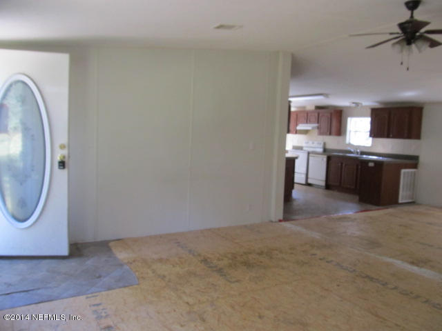 830 Gregory Road Jacksonville, FL 32234 - Photo 2 of 31 FRONT ENTRY & LIVING ROOM
