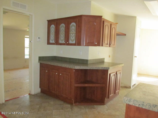 830 Gregory Road Jacksonville, FL 32234 - Photo 22 of 31 BUILT-IN CHINA CABINET & MASTER ENTRY