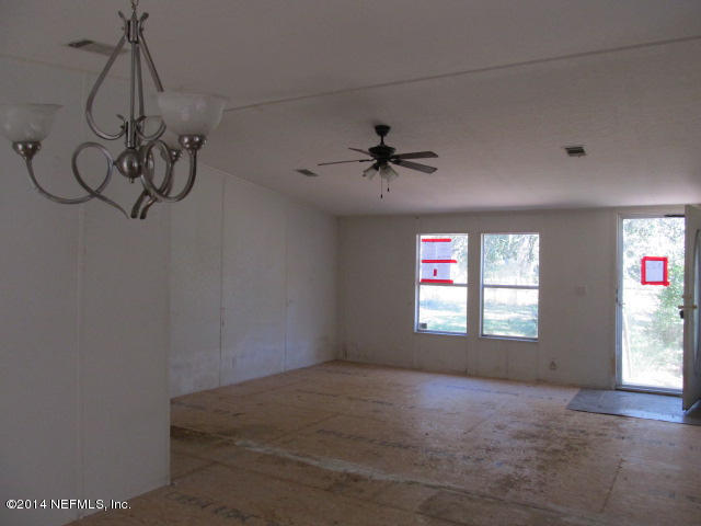 830 Gregory Road Jacksonville, FL 32234 - Photo 4 of 31 DINING AREA & VIEW OF LIVING ROOM