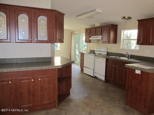 830 Gregory Road Jacksonville, FL 32234 - Photo 6 of 31 KITCHEN & BUILT-IN CHINA CABINET