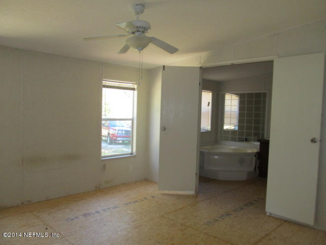 830 Gregory Road Jacksonville, FL 32234 - Photo 10 of 31 MASTER BEDROOM & BATHROOM ENTRY