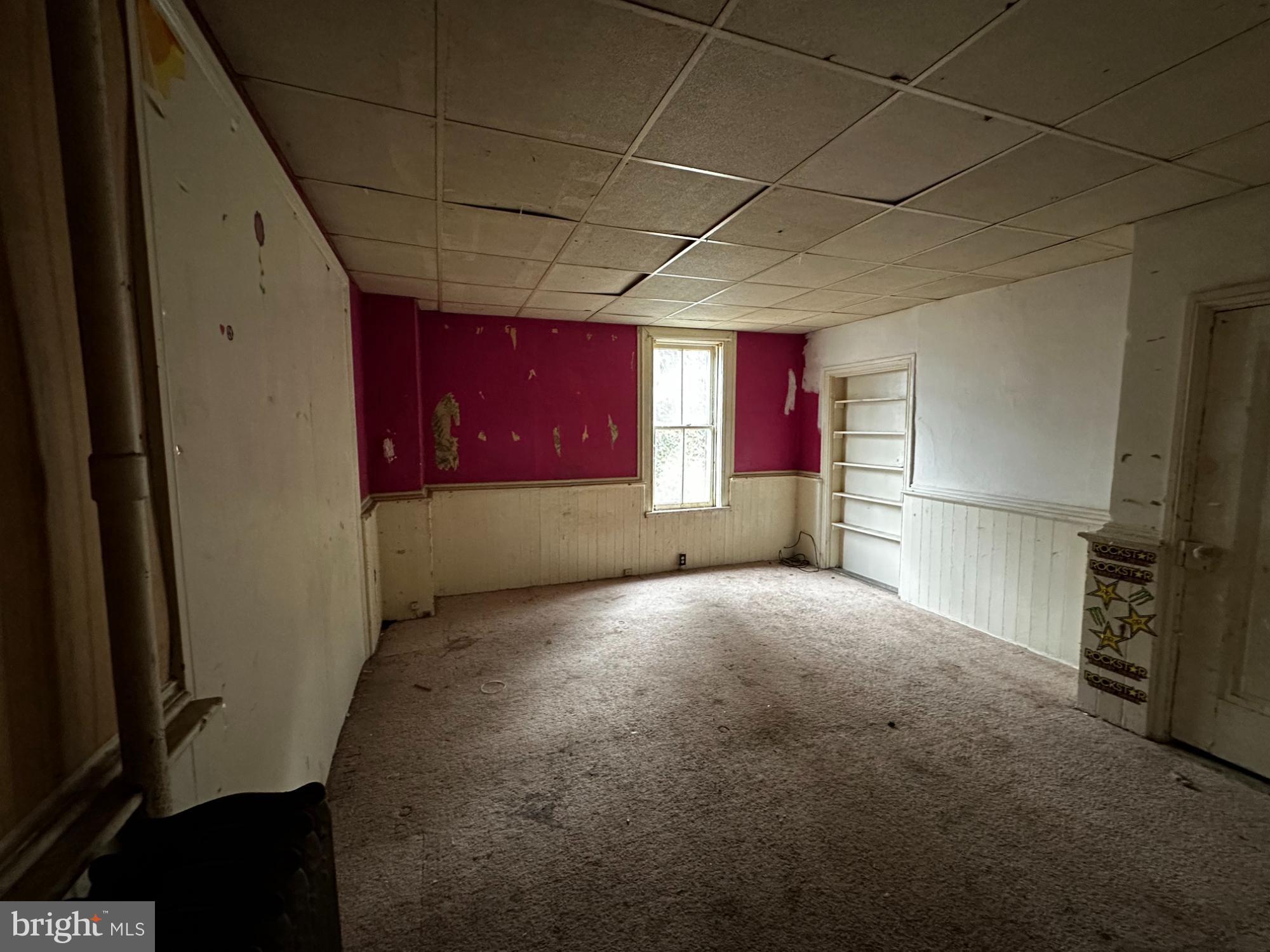 215 South Spring Street Bellefonte, PA 16823 - Photo 8 of 13 a view of empty room with windows