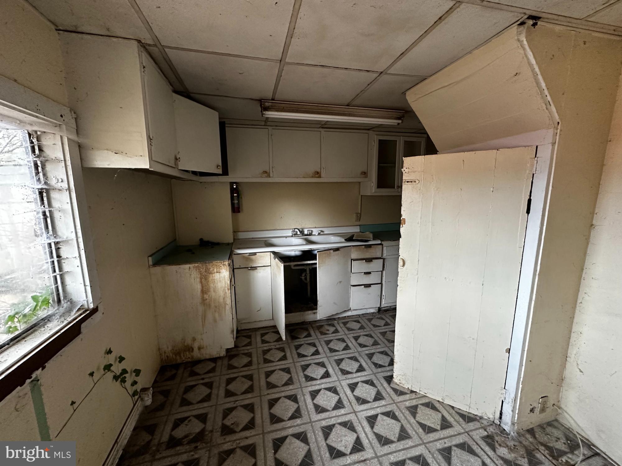 215 South Spring Street Bellefonte, PA 16823 - Photo 9 of 13 a kitchen with a refrigerator and a stove