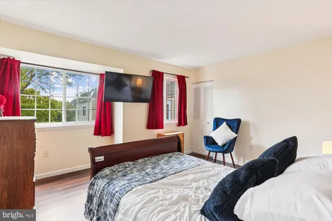 a bathroom with a shower a toilet and a sink