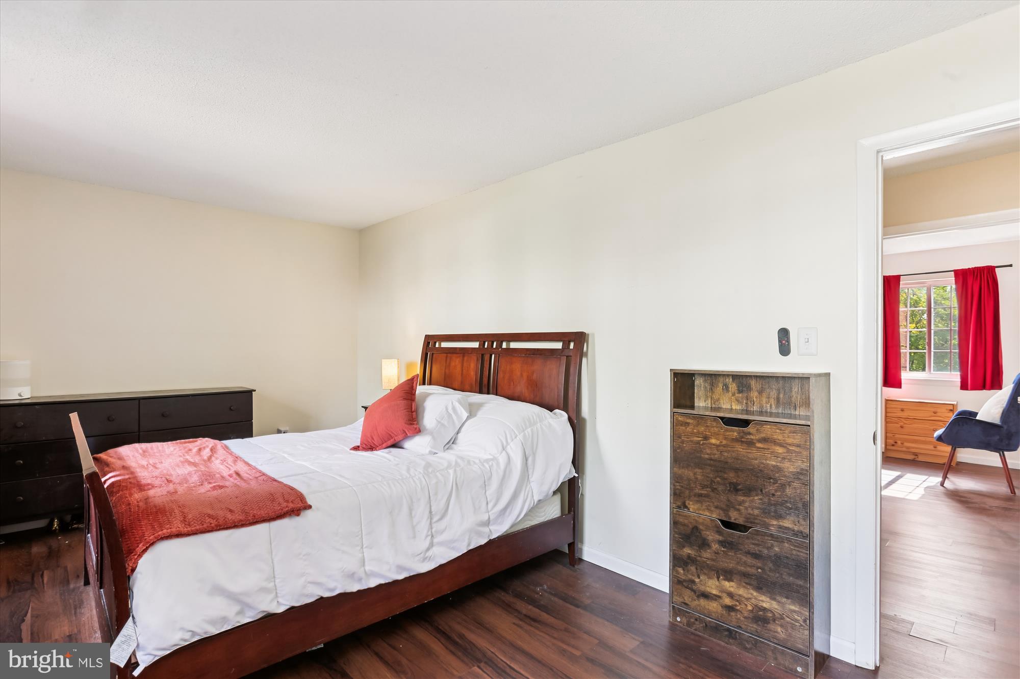 11407 Stoney Point Place Germantown, MD 20876 - Photo 21 of 85 a bedroom with a bed and wooden floor