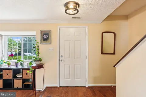 a view of a cars parked in front of a house