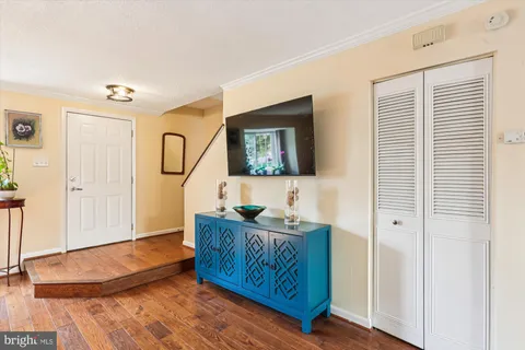a bedroom with furniture and window