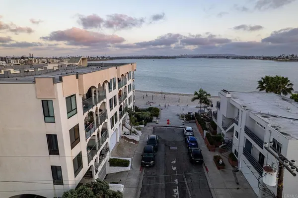 a view of parking garage with cars