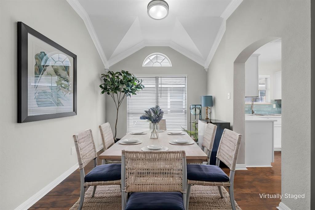10124 Bunting Drive Waco, TX 76708 - Photo 4 of 18 a view of a dining room with furniture and wooden floor