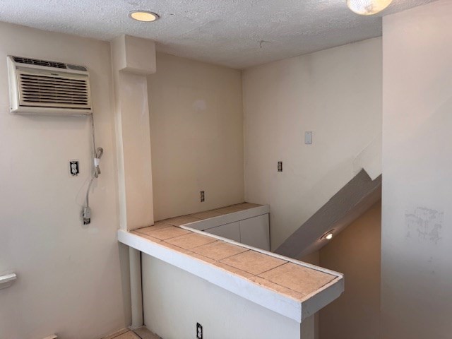 14 Dane Street, Unit 3 Everett, MA 02149 - Photo 17 of 19 a room with storage and utility