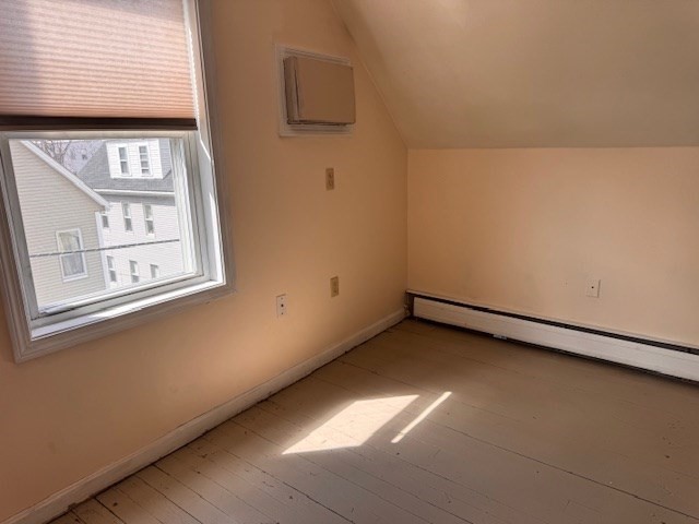 14 Dane Street, Unit 3 Everett, MA 02149 - Photo 4 of 19 a view of a small space with wooden floor and windows